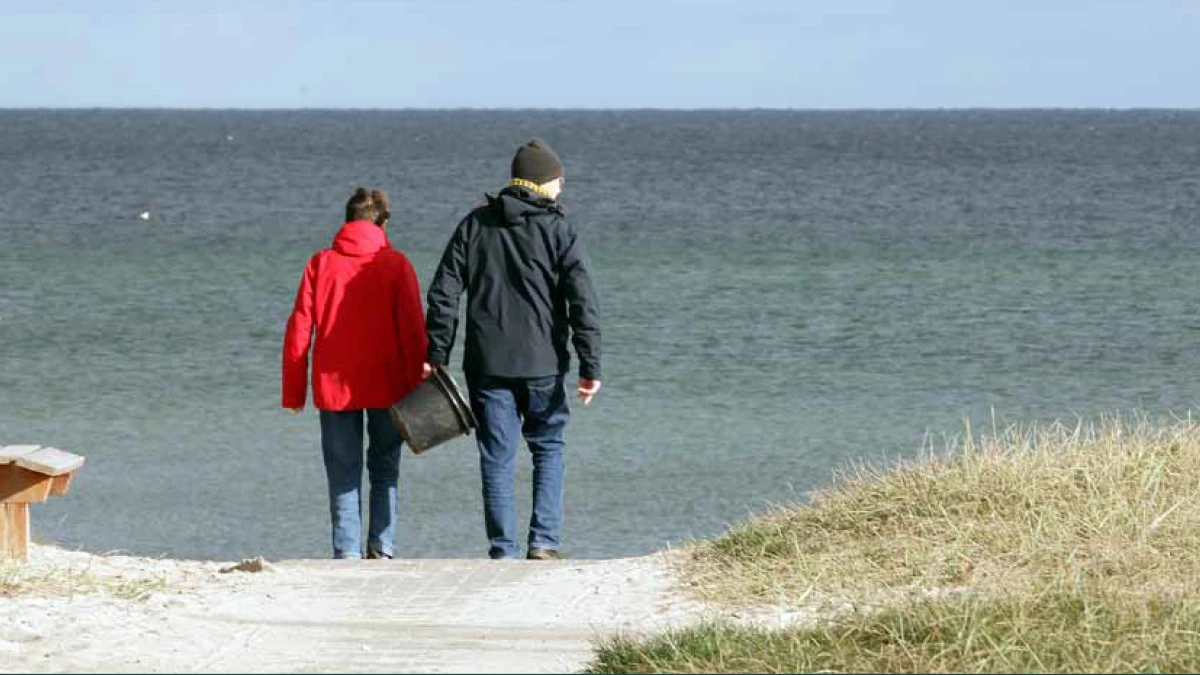 Mennesker ved stranden